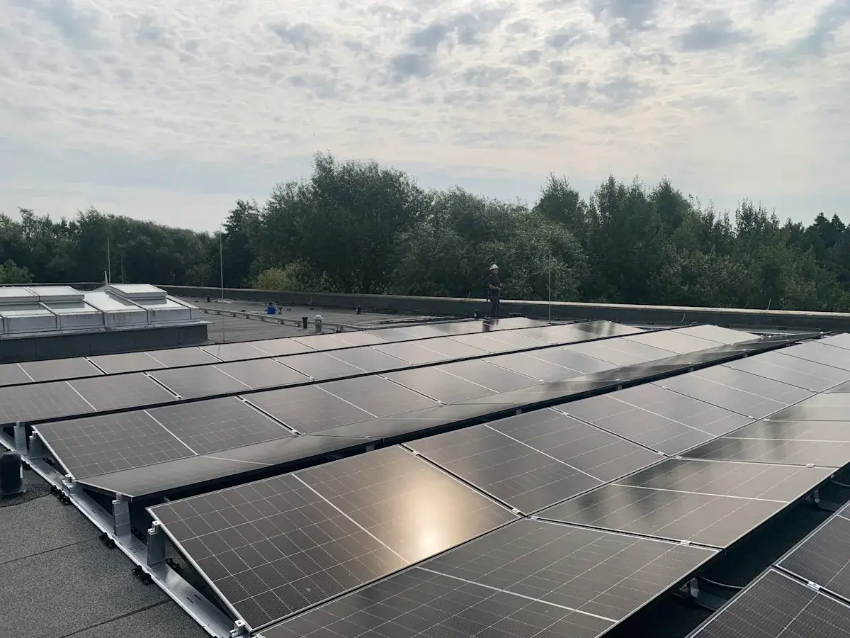 Solar panels installed on the roof of the ISH school building